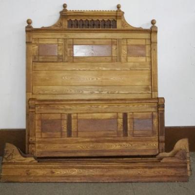 Sale Photo Thumbnail #190: 1190	ANTIQUE OAK BED WITH BURL WOOD PANELS AND TURNED SPINDLES, APPROXIMATELY 57 IN X 69 IN H X 78 IN L
