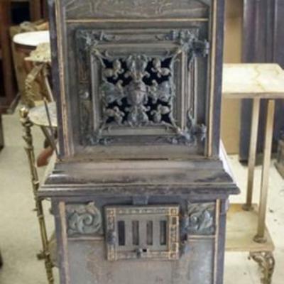 Sale Photo Thumbnail #146: 1146	JULIUS WURMBACH GERMAN COAL HEATER STOVE, APPROXIMATELY 17 IN X 13 IN X 56 IN H TOTAL, 3 SECTIONS, SOME LOSS TO CASTING
