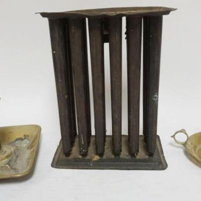 Sale Photo Thumbnail #61: 1061	ANTIQUE BRASS PUSH UP CANDLESTICKS & 18 PART TIN CANDLE MOLD, LARGES PIECE APPROXIMATELY 8 1/2 IN X 5 IN X 11 IN
