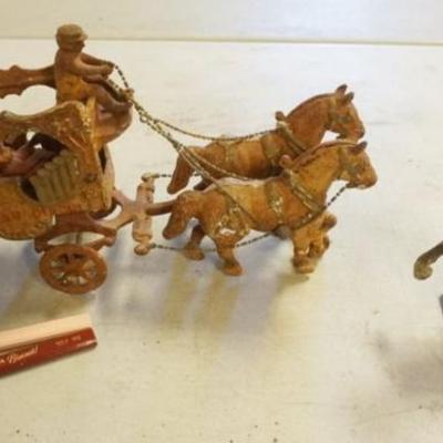 Sale Photo Thumbnail #240: 1241	GROUP OF ASSORTED CAST METAL ITEMS, TOY HORSE DRAWN CIRCUS WAGON, ASIAN HORSE, ETC. TOY APPROXIMATELY 13 IN X 4 IN X 8 IN 
