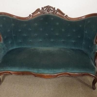 Sale Photo Thumbnail #201: 1201	WALNUT VICTORIAN UPHOLSTERED LOVE SEAT WITH CARVED CREST AND BUTTON BACK, APPROXIMATELY 36 IN X 26 IN X 41 IN H

