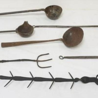 Sale Photo Thumbnail #107: 1107	GROUP OF ASSORTED PRIMITIVE METAL LADLES, HAND FORGED FORK, CORN COB DRYING RACK, LARGEST APPROXIMATELY 21 IN L
