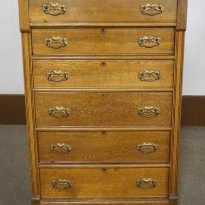 Sale Photo Thumbnail #187: 1187	OAK 6 DRAWER TALL CHEST WITH PANELED SIDES, APPROXIMATELY 37 IN X 20 IN X 56 N H
