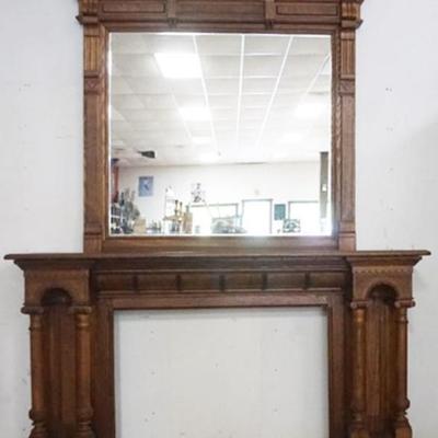 Sale Photo Thumbnail #215: 1215	2 PART VICTORIAN OAK MANTLE WITH MIRROR TOP, TURNED COLUMNS AT BASE, APPROXIMATELY 73 IN X 15 IN X 104 IN H
