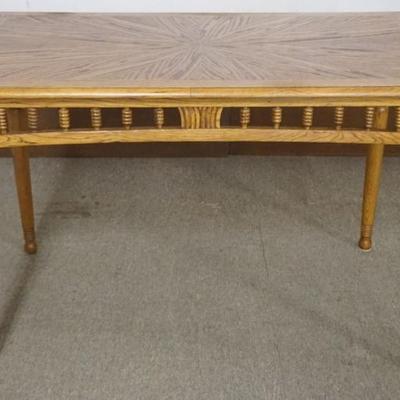 Sale Photo Thumbnail #194: 1194	CONTEMPORARY OAK TABLE WITH TURN SPINDLE SIDES, APPROXIMATELY 48 IN X 30 IN X 30 IN H
