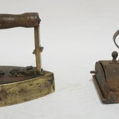 Sale Photo Thumbnail #84: 1084	2 ANTIQUE COAL FLAT IRONS, ONE BRASS, LARGEST APPROXIMATELY 8 IN X 4 IN X 7 IN HIGH
