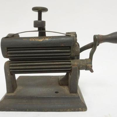 Sale Photo Thumbnail #95: 1095	CAST IRON FLUTTER APPROXIMATELY 8 IN  X 8 IN X 10 IN H
