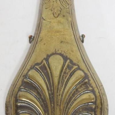Sale Photo Thumbnail #59: 1059	ANTIQUE BRASS POWDER FLASK W/EMBOSSED DESIGN ON BOTH SIDES, APPROXIMATELY 9 IN HIGH
