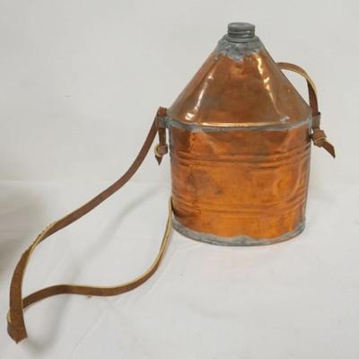 Sale Photo Thumbnail #122: 1122	ANTIQUE HAND SOLDERED COPPER CANTEEN, APPROXIMATELY 9 1/2 IN H
