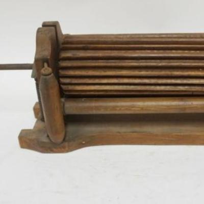 Sale Photo Thumbnail #137: 1137	ANTIQUE WOOD CLOTHES WRINGER, APPROXIMATELY 31 IN X 7 IN X 9 IN, WHEELER &SHIPLEY 1878
