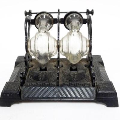 Sale Photo Thumbnail #3: 1003	ANTIQUE DOUBLE INKWELL W/REVOLVING GLASS WELLS IN CAST METAL BASE, APPROXIMATELY 7 IN X 4 1/2 IN X 4 IN HIGH
