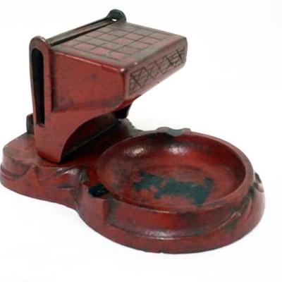 Sale Photo Thumbnail #55: 1055	UNUSUAL CAST IRON ASHTRAY CIGARETTE DISPENSER W/SCOTTIE DOG IMAGE IN CENTER OF ASHTRAY, APPROXIMATELY 8 IN X 5 IN X 5 IN
