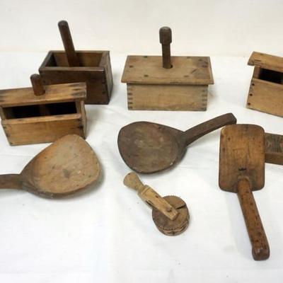 Sale Photo Thumbnail #120: 1120	GROUP OF ASSORTED PRIMITIVE WOOD BUTTER MOLDS AND SCOOPS, LARGEST APPROXIMATELY 8 IN X 5 IN X8 IN H
