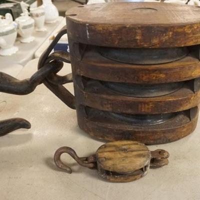 Sale Photo Thumbnail #127: 1127	UNION HARDWARED BLOCK AND TACKLE PULLEY AND SMALLER PULLY, LARGEST APPROXIMATELY 25 IN X 9 IN X 11 IN

