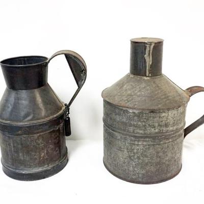 Sale Photo Thumbnail #121: 1121	2 PRIMITIVE TIN PITCHERS, 1 WITH STAMPED TAG, J.D. WILKINSON, PLATTSBURG, NY, TALLEST APPROXIMATELY 10 1/2 IN H
