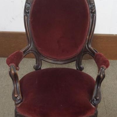 Sale Photo Thumbnail #212: 1212	WALNUT VICTORIAN CARVED PARLOR ARM CHAIR, APPROXIMATELY 28 IN X 32 IN X 44 IN H
