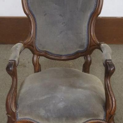 Sale Photo Thumbnail #210: 1210	WALNUT VICTORIAN FINELY CARVED PARLOR ARM CHAIR, APPROXIMATELY 25 IN X 22 IN X 41 IN H
