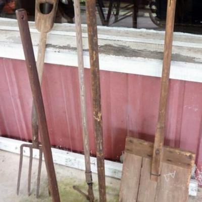 Sale Photo Thumbnail #157: 1157	GROUP OF ASSORTED PRIMITIVE TOOS, WOOD SHOVEL, TAMPER, HAND PLUNGER FOR WASHING, ETC.
