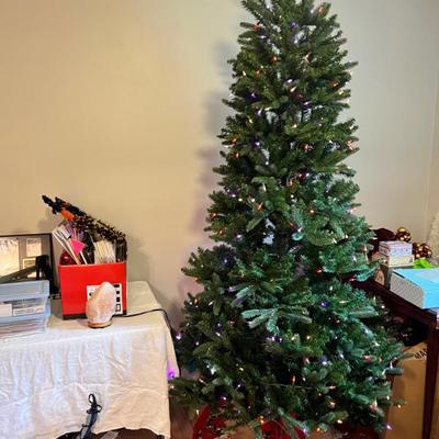 Sale Photo Thumbnail #86: Prelit Christmas tree with multiple-option lights and settings. 