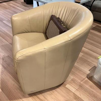 Sale Photo Thumbnail #83: Natuzzi leather swivel barrel chair. 