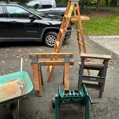Metal Wheelbarrow, Suncast Hose Reel, 4 Sawhorses And 6’ Werner Wooden Ladder 