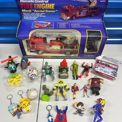 HST014- TOYS! 1990’s Mack Fire Engine W/ Misc Small Toys 