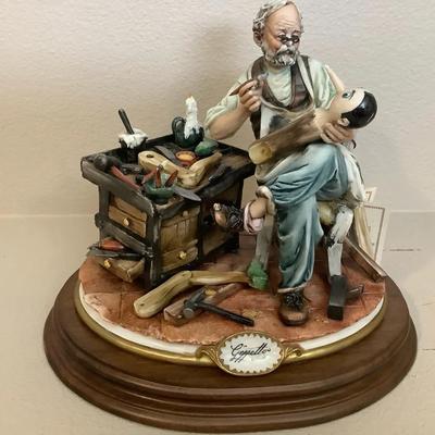 Capodimonte Porcelain Pinocchio Creation Geppetto Statue. 
