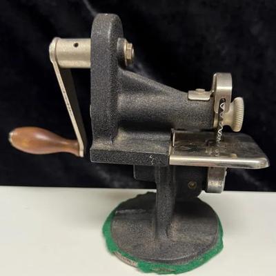vintage Singer Hand Crank Pinker, also known as a Pinking Machine.  This