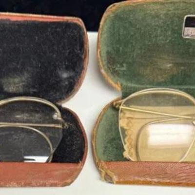 antique eyeglasses, likely from the early 20th century (1920s-1930s