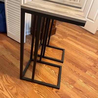 Sale Photo Thumbnail #46: $60 Pair of contemporary metal and laminate side tables; 26” high x 12” wide x 15” deep. 