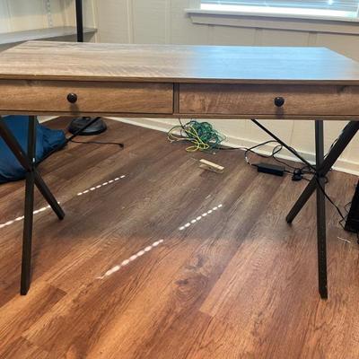 Sale Photo Thumbnail #42: $75 Contemporary desk, driftwood finish with metal frame, two drawers; 30 inches high by 43 1/4 inches wide by 20 1/2 inches deep.