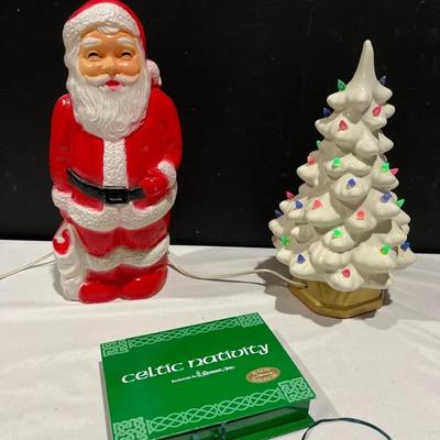 Lighted Christmas Tree, Santa Blow Mold, And Celtic Nativity