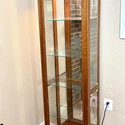 Lighted Oak Curio Cabinet with Glass Shelves and Mirrored Back