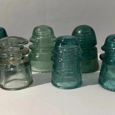 Antique vintage glass insulators made in the US for Electrical, telegraph, and telephone Lines 