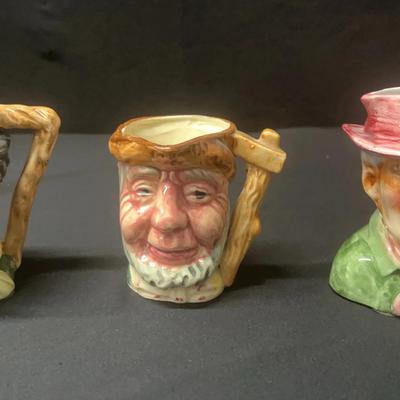 Set a vintage porcelain whimsical old man and Tobi heads style creamers made in Portugal and Japan