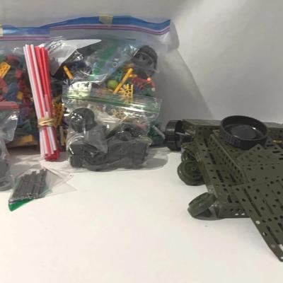 Bag of K’Nex mega construx, tires, and wheel parts, & Erector 