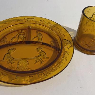 Indiana Amber glass children plate and cup set decorated with embossed nursery rhymes