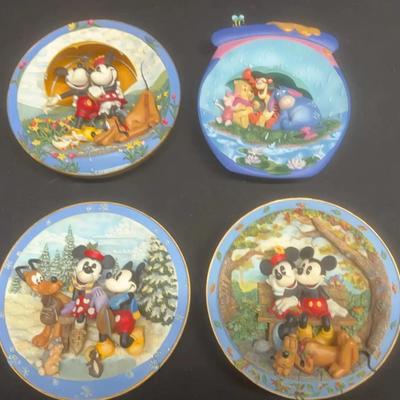 Collection of Disney 3-D plates with Mickey, Minnie Pluto, Winnie the Pooh and friends
