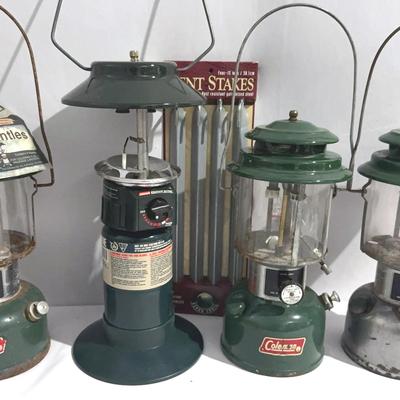 4 VINTAGE Coleman Lanterns and Metal Tent Stakes 