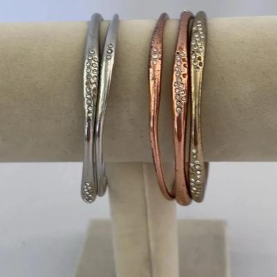 Stacking Bangle Bracelets in rose & yellow gold, and silver tones