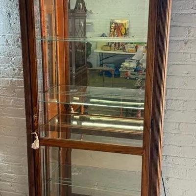 Howard Miller Lighted Curio/Display Cabinet With Key