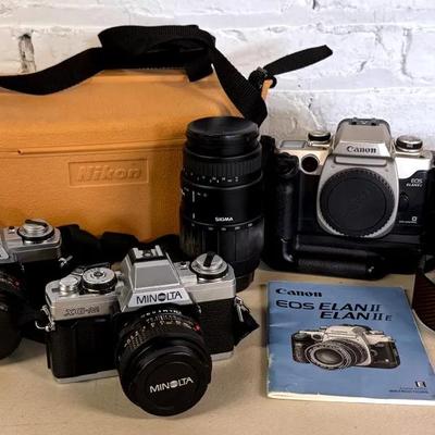 Vintage Cameras (3) With Minolta XG-M, Canon EOS ELAN II E, Nikon Hard Case, Etc