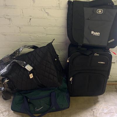 Assortment Of Black Luggage