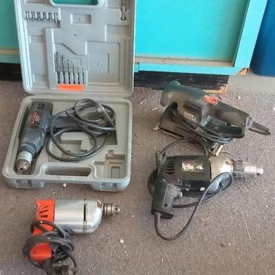 Three Drills And A Sander