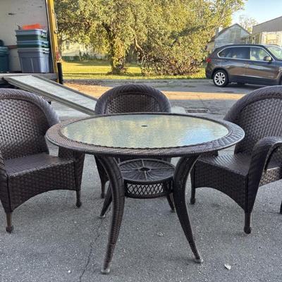 Sale Photo Thumbnail #69: Lot 85 – Outdoor Wicker Chair & Table Set