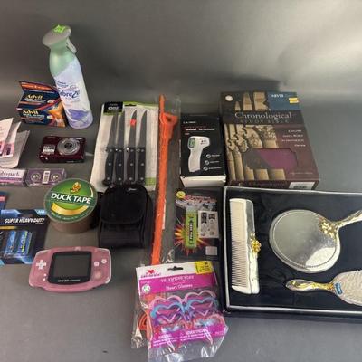 Sale Photo Thumbnail #65: Lot 81 – Nikon Coolpix L22, Vanity Set, & More