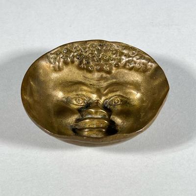 BRONZE RELIEF BOWL / ASHTRAY WITH FACE | A small decorative bowl or ashtray with a sculpted face to the interior, no apparent markings -...