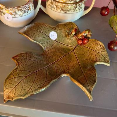 Sale Photo Thumbnail #344: Handmade pottery leaf. Signed. 