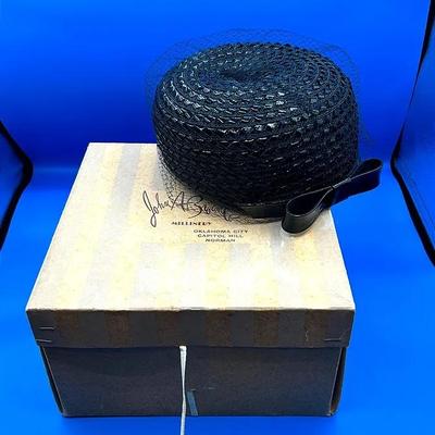 BJ372 Black pillbox hat with a veil and flat bow. 