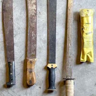 Knife Assortment, Sword, And Sharpener 